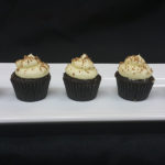 Mini-chocolate-cupcake-with-cream--cheese-frosting-and-a-dusting-of-chocolate